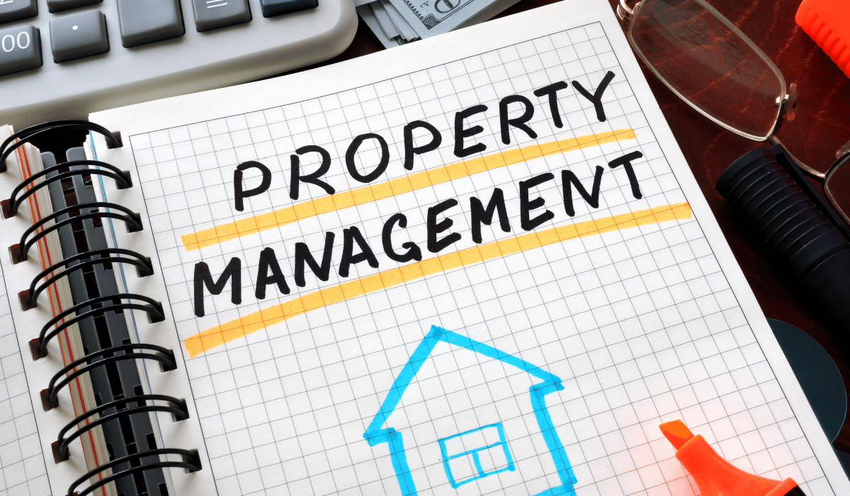 PROPERTY MANAGEMENT is written in a notebook