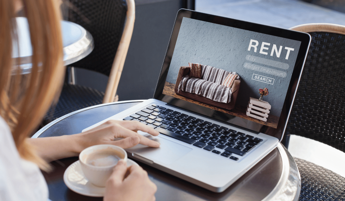 A tenant using a laptop to access online portals.