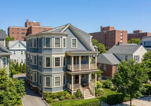 Converted triple-decker condominium building near a university neighborhood in Cambridge, MA